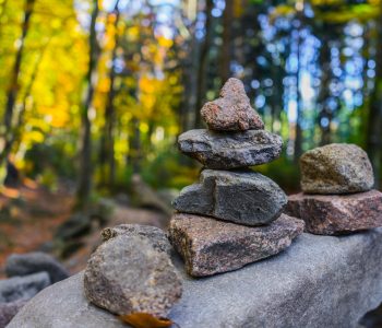 balance-blurred-background-boulders-715414